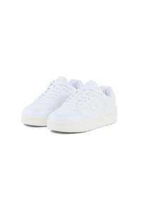 White sneakers with textured leather, quilted accents, flat laces, and a rubber sole featuring a slight elevation. Logo embossed on the side.