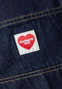 Carhartt WIP NASH PANT SMITH - Relaxed fit -farkut - blue rinsed
