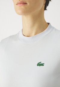 Lacoste Sport CLASSIC - T-shirts - phoenix blue