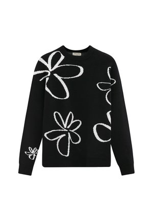 Pull noir à col rond, orné de motifs floraux blancs de formes et de tailles variées tricotés sur le devant et les manches.