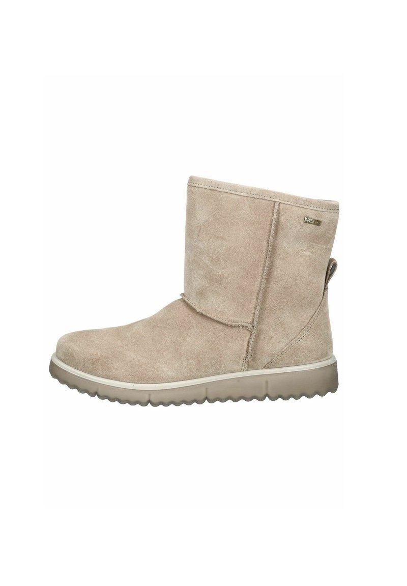 Botín de ante beige hasta el tobillo con punta redondeada, suela de goma plana, costuras sutiles y una pequeña tira en la parte posterior para facilitar el calzado.