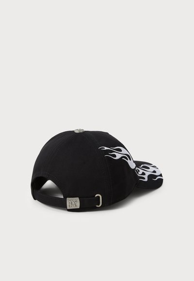 Black baseball cap with a curved brim, featuring white flame graphics on the side and a metal adjustment strap at the back.