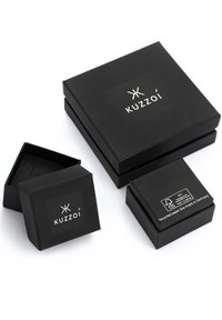 Black recycled paper gift boxes with a matte finish; features a logo "Kuzoi" on a label. Includes a larger and two smaller boxes.