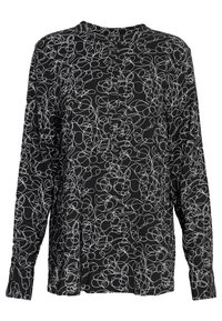 Blouse noire à manches longues avec un motif de lignes abstraites blanches, col rond et détails de boutons à l'avant. Tissu doux avec une coupe décontractée.