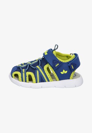 Blue and yellow sandal with mesh upper, multiple cutouts, secure velcro strap, and cushioned white sole. Features prominent branding accents.