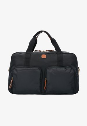 Sac de voyage noir en nylon durable, avec deux poches zippées à l'avant, des poignées en tissu solides et des accents en cuir.