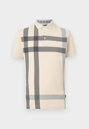 Μπεζ κοντομάνικο πόλο πουκάμισο με μεγάλο καρό μοτίβο σε μαύρο και γκρι και γιακά με κουμπιά, σε απλό φόντο.