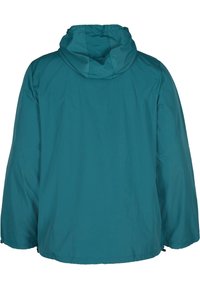 Teal hættetrøje med en løs pasform, lange ærmer og elastiske detaljer ved hætten og kanten, lavet af glat, let materiale.