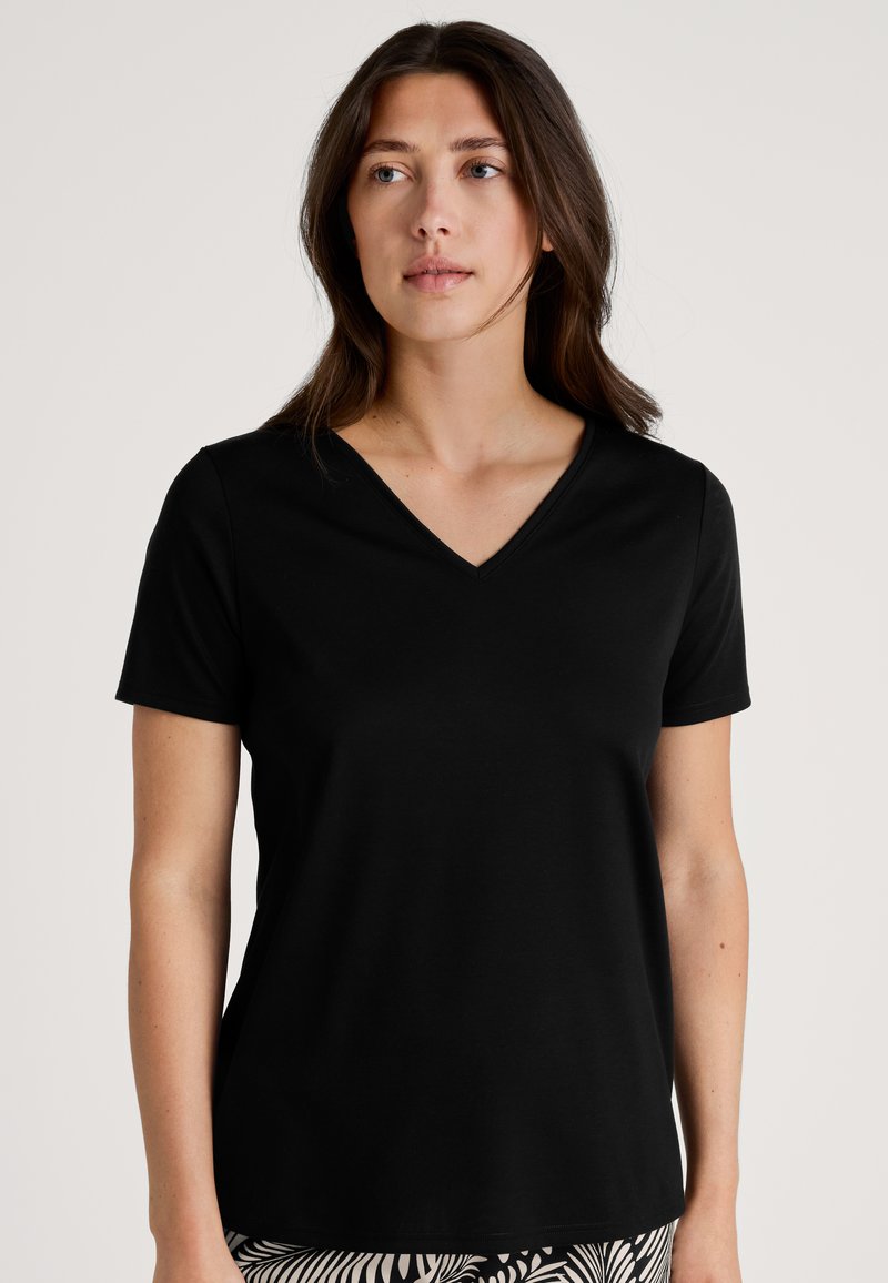 Black V-neck T-shirt made of soft fabric with short sleeves. Simple design, tailored fit, and smooth texture. No additional patterns or accents.