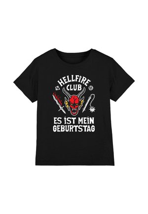 Black cotton t-shirt featuring a red graphic of a demon face and text "HELLFIRE CLUB ES IST MEIN GEBURTSTAG" in white, with decorative elements.