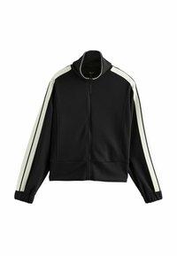 Veste zippée noire avec des rayures blanches sur les côtés, col montant et poignets élastiques. Fabriquée en tissu doux, avec une coupe décontractée et sans quincaillerie visible.