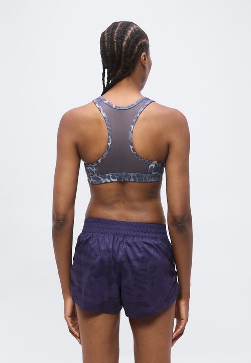 PUMA 4KEEPS BRA - Medium support sports bra - inky depths — photo 3