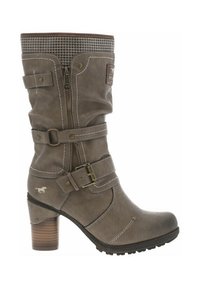 Bottine en cuir marron avec un talon empilé, fermeture éclair, deux sangles, bordure à motif pied de poule et détails de couture blanche.