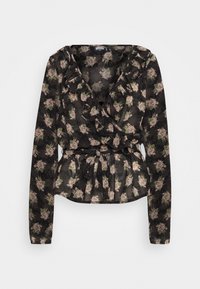 Blouse noire à motif floral avec manches longues, tissu léger et transparent, encolure à volants, taille ceinturée et motif floral rose avec accents verts.