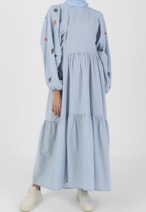 Light blue, long-sleeve dress with tiered skirt, featuring embroidered accents. Made of soft material with a relaxed fit and crew neckline.