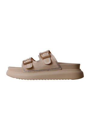 Beige slidssandal med to justerbare spænder, rhinstenbesætning på stropperne og en tyk, tekstureret sål til afslappet brug.