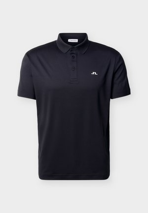 Polo noir à manches courtes avec trois boutons et un petit logo blanc sur le côté gauche de la poitrine.