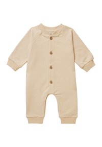 Salopette en coton beige avec des manches longues, des poignets côtelés et un col rond ; présente cinq boutons en bois sur le devant.