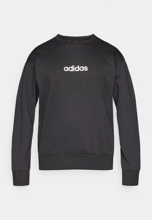 Fekete pulóver pamut keverékből, környakú, hosszú ujjú, fehér "adidas" logóval a mellkason. Puha, texturált anyag.
