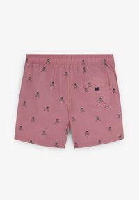 Pantaloni scurți de înot roz, cu un model de oase și cranii negre, cu un elastic la talie și o buzunare pe spate.
