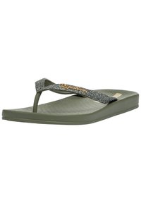 Green rubber flip-flop with a textured sole, featuring a glittery strap and decorative accents. Simple design with a flat profile.