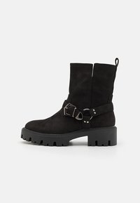 Bottines à plateau - black