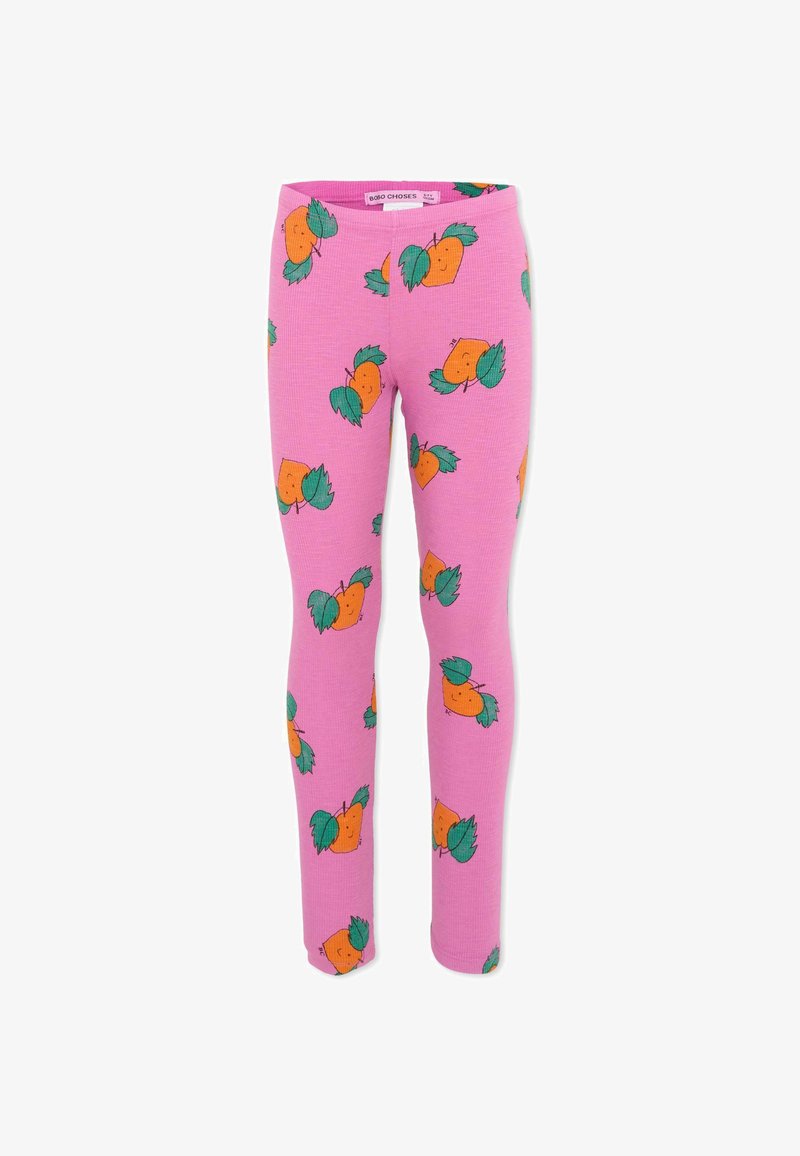 Leggings roses pour enfants avec un motif répétitif de visages d'orange agrémentés de feuilles vertes.