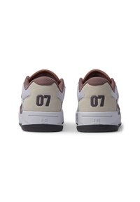Sneakers with a grey and beige upper, dark brown accents, a textured heel, and black outsole; features the number "07" on the back.