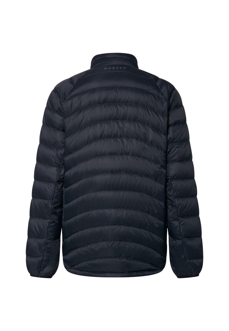 Chaqueta acolchada azul marino con diseño acolchado, cuello alto y puños elásticos. Fabricada con material ligero y suave, con el logo en el cuello.