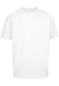 White cotton t-shirt with short sleeves, crew neckline, and a relaxed fit. No patterns or embellishments present. Smooth texture.