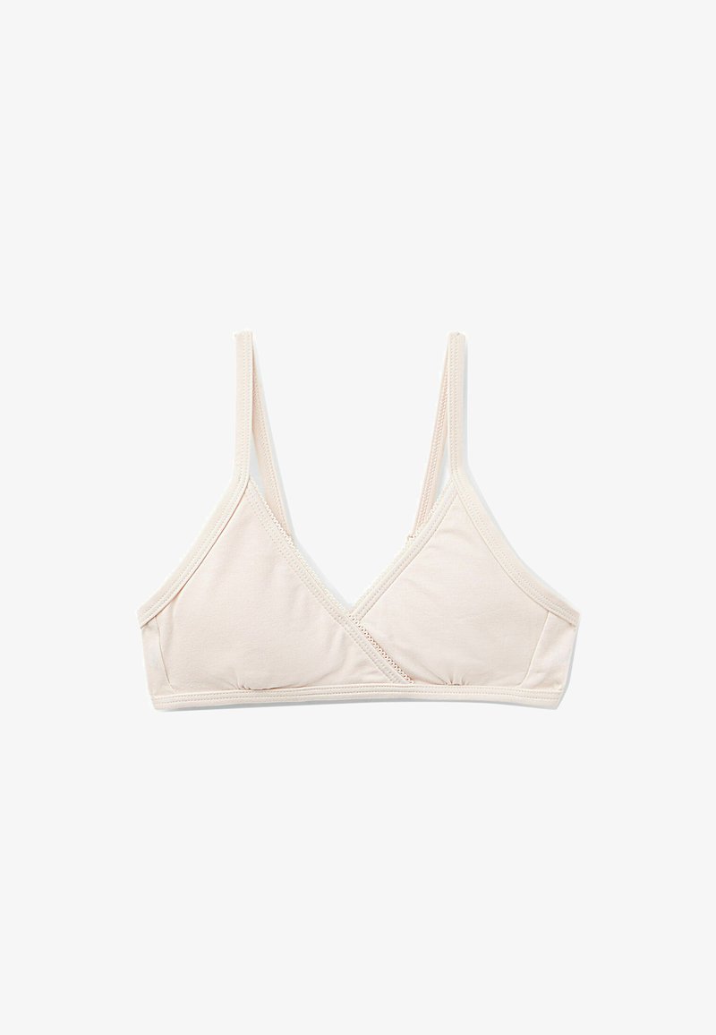Soutien-gorge en tissu beige doux avec une forme triangulaire, des bretelles fines ajustables et un décolleté en V. Présente des coutures discrètes le long des bords.