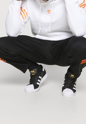 Pantalon de survêtement - black