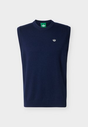 Vestă tricotată bleumarin fără mâneci, cu guler și tiv cu dungi, având un mic logo alb Adidas Trefoil pe partea stângă a pieptului.
