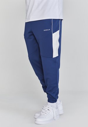 JOGGERS - Tracksuit bottoms - navy
