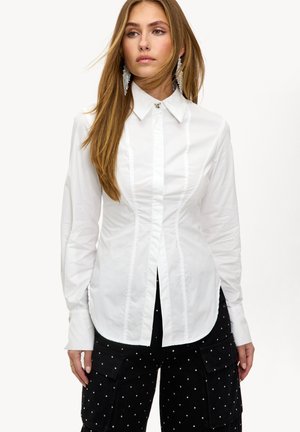Blusa - solid white
