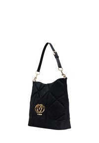 Black quilted fabric handbag with a gold logo accent, a single adjustable strap, and a soft texture. Features a slouchy design.