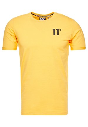 T-shirt en coton jaune à manches courtes. Présente un logo noir "11°" sur le devant, un col rond et une coupe confortable.