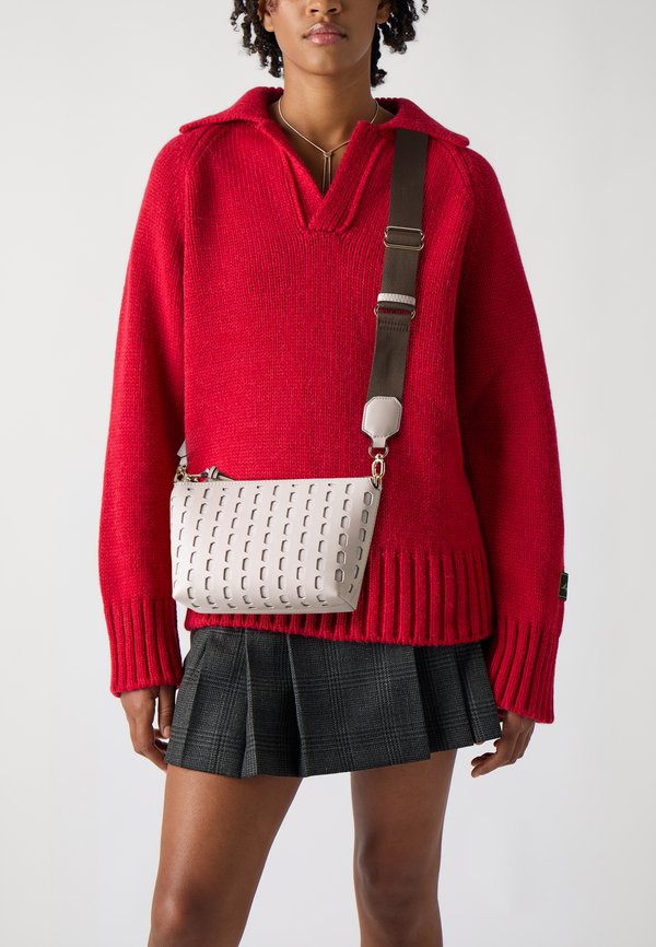 PHUKET HOLES  - Cross body bag - ecru