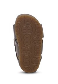 Brun gummisandal sula med texturerat grepp som har cirkulära mönster och remmar på båda sidor för en säker passform.