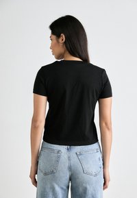 Calvin Klein Jeans INSTITUTIONAL GRAPHIC - Print T-shirt - black