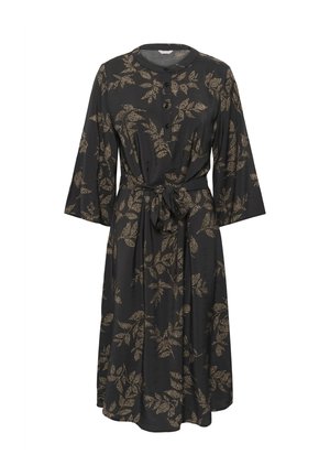 Fekete ruha arany levélmintával, kerek nyakkivágással, gombos részletekkel, háromnegyedes ujjakkal és megkötős derékkal a hangsúlyos alakért.