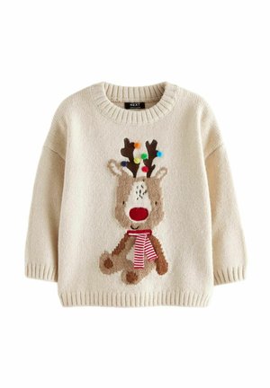 Cream-colored knit sweater featuring a reindeer design with antlers, red nose, and a striped scarf, accented with colorful pom-poms.