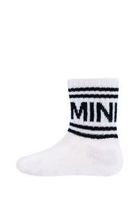 Weißer Knöchelstrumpf mit schwarzen Streifen und fettem, rund um den Bund gestricktem "MINI"-Text, präsentiert vor einem schlichten weißen Hintergrund.