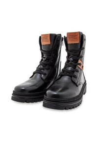 Schwarze Leder-Stiefeletten mit Schnürverschluss und seitlichem Reißverschluss. Mit einem braunen Akzentpatch und einer strukturierten Gummisohle für Griffigkeit.