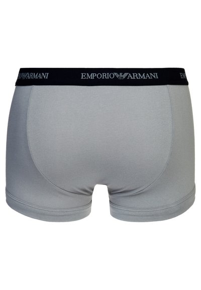 Grå bomull boxershorts med svart elastisk linning som har "Emporio Armani" logo i hvitt. Glatt tekstur og tettsittende design.