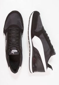 Puma Sneakers - black