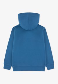 Μπλε φούτερ με κουκούλα, που διαθέτει μαλακή υφή, μακριά μανίκια και άνετη σχεδίαση χωρίς ραφές με στρογγυλεμένη κουκούλα. Καθημερινό και απλό σχέδιο.