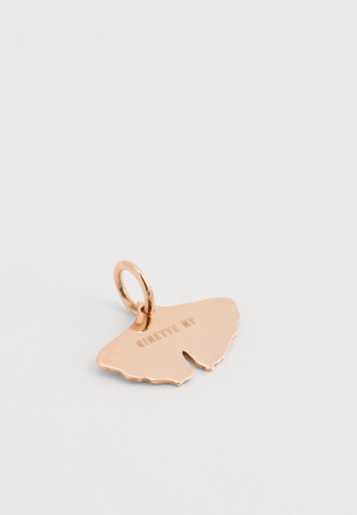 Rose gold butterfly-shaped charm with a textured edge and engraved "GINETTE NY" on one side. Features a small loop for attachment.