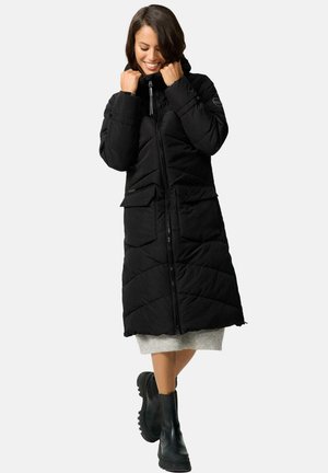 Black puffer coat with a hood, featuring a full front zipper, two large chest pockets, and a quilted design. Smooth texture and knee-length.