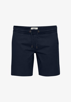 Námornícky modré plávacie šortky vyrobené z ľahkého materiálu, vybavené elastickým pásom s šnúrkou na stiahnutie, bez viditeľných vreciek alebo vzorov.